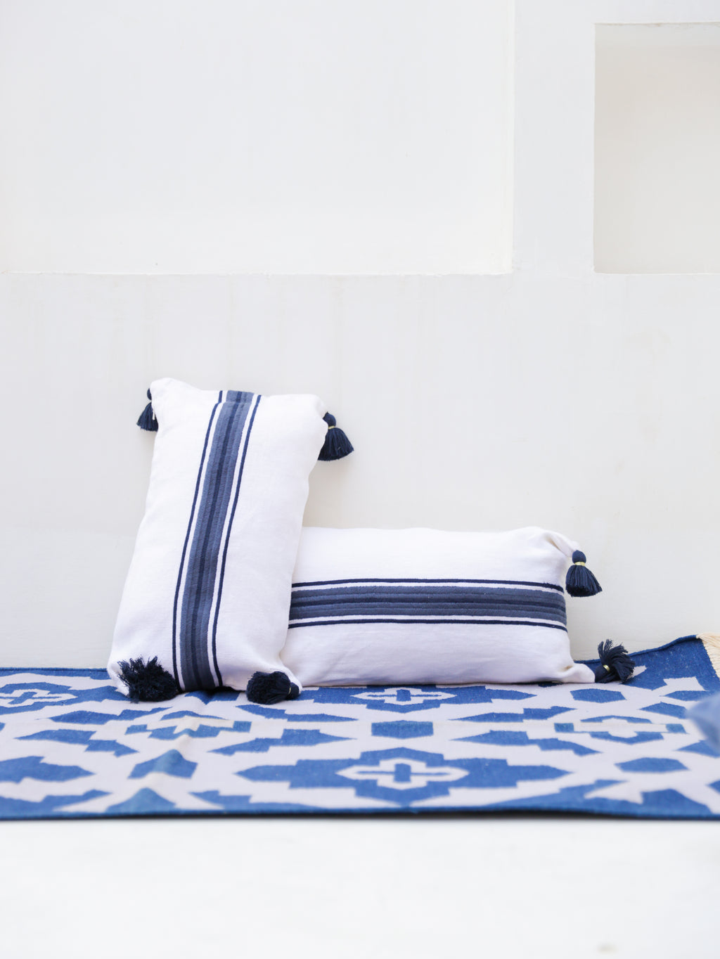 BLUE & WHITE STRIPED CUSHION 12X21