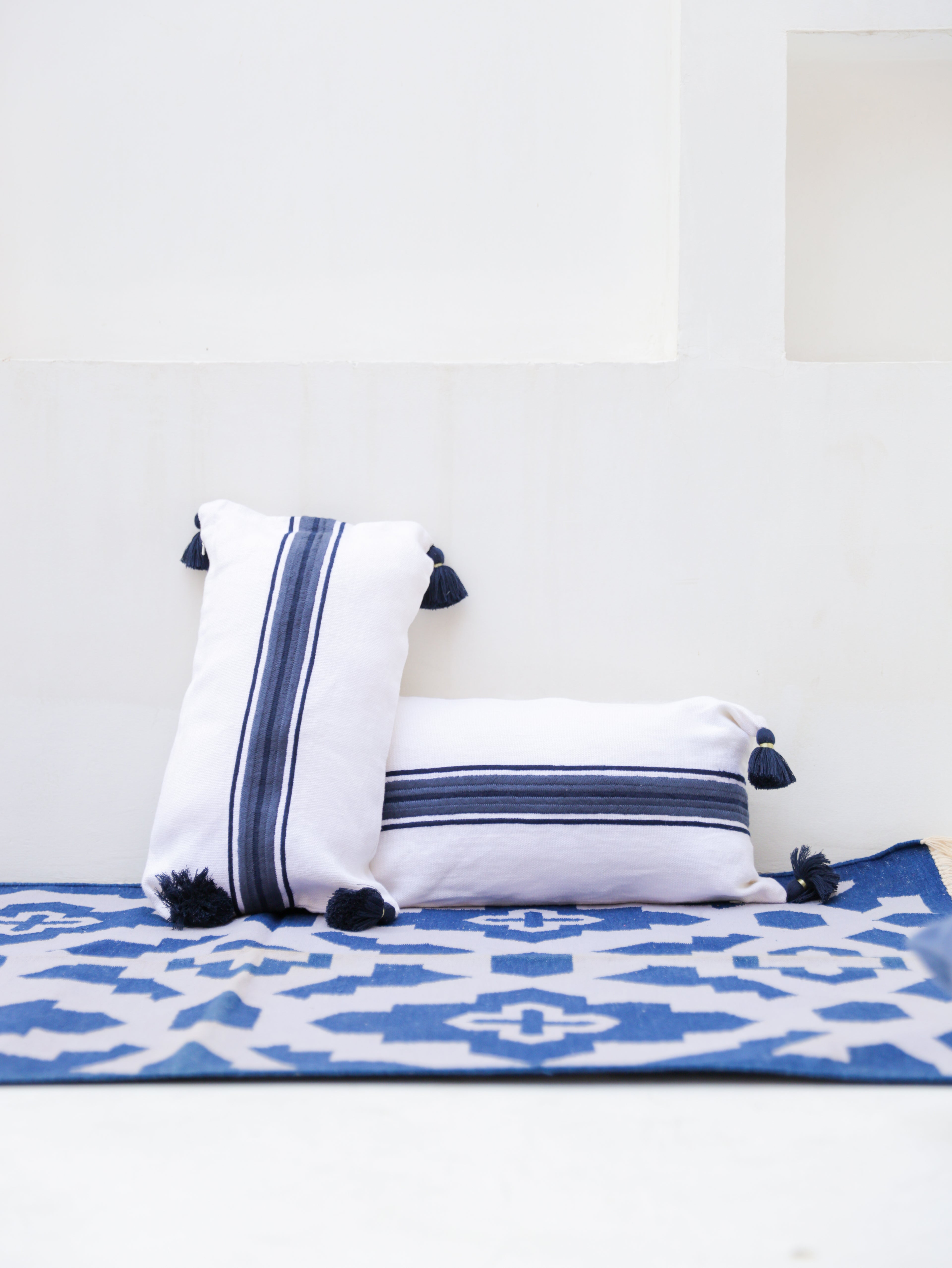 BLUE & WHITE STRIPED CUSHION 12X21