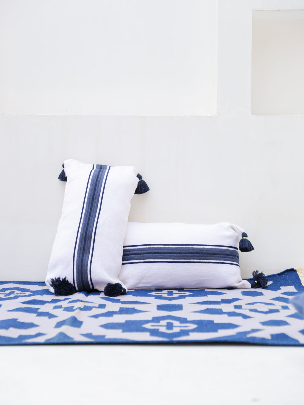 BLUE & WHITE STRIPED CUSHION 12X21