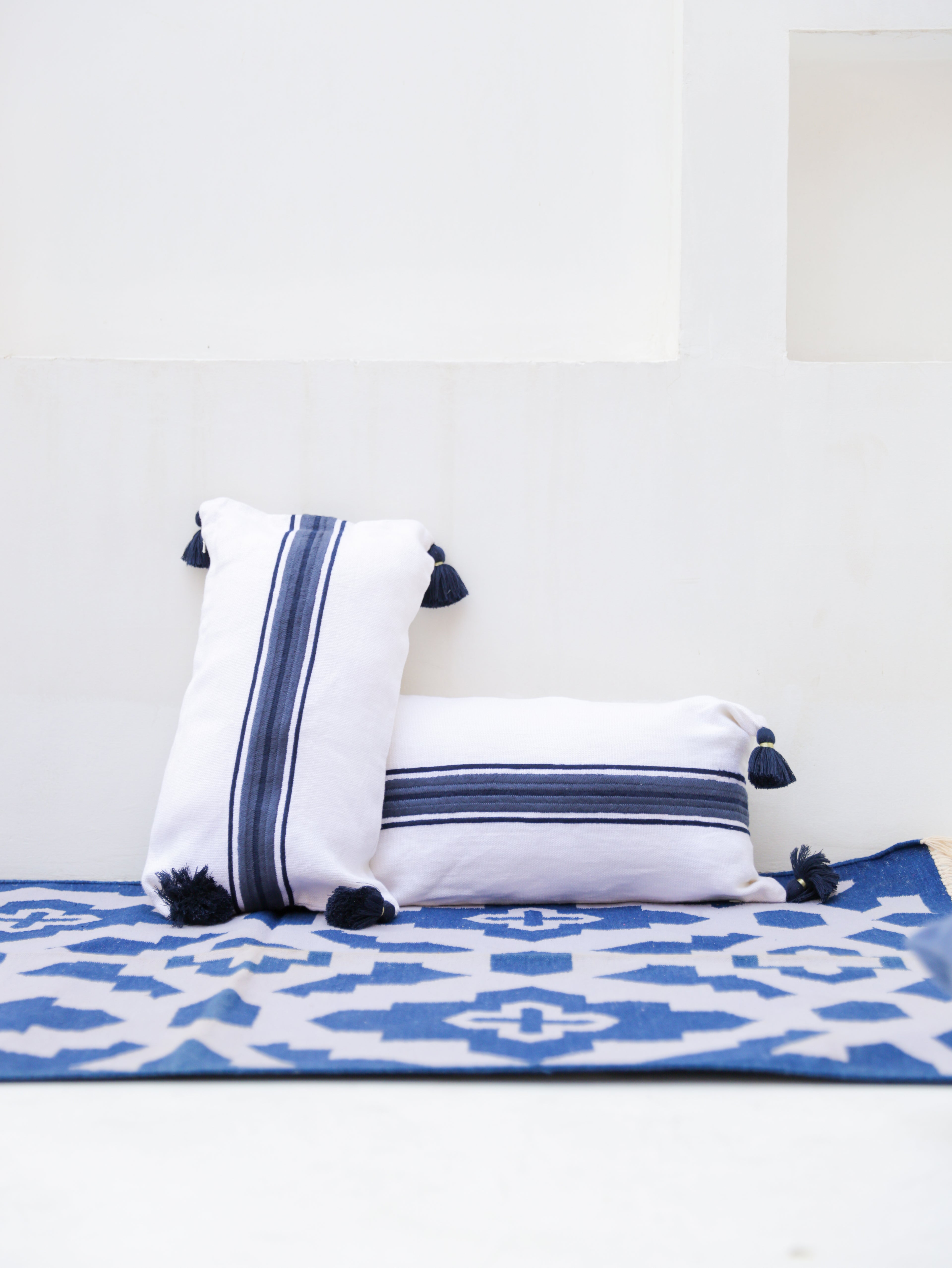 BLUE & WHITE STRIPED CUSHION 12X21